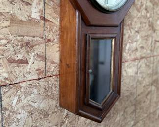 This lot features a Seth Thomas “World” model long-drop schoolhouse clock from the late 19th century.  It features a distinctive octagonal top and a long lower case for the pendulum. Tested and in good working condition with key. Measures, 32” H x 17” W.