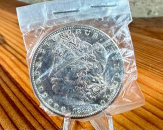 This lot features a 1882-S Morgan Dollar.