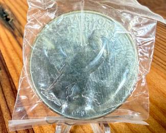 This lot features a 1927 Peace Dollar.