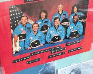 This lot features a curated collection of space memorabilia held and displayed in a wooden frame. Includes an autograph from Christa McAuliffe and much more. This piece measures in frame, 22.5” H x 18.75” W.