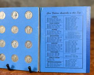 This lot features a beautiful collection of silver quarters, held and displayed in a Whitman folder. There are a total of thirty-three (33) silver quarters.