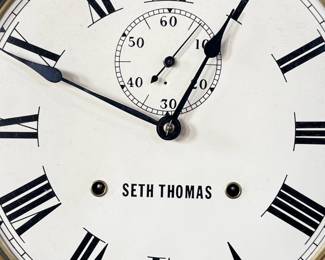 This lot features a Seth Thomas “World” model long-drop schoolhouse clock from the late 19th century.  It features a distinctive octagonal top and a long lower case for the pendulum. Tested and in good working condition with key. Measures, 32” H x 17” W.
