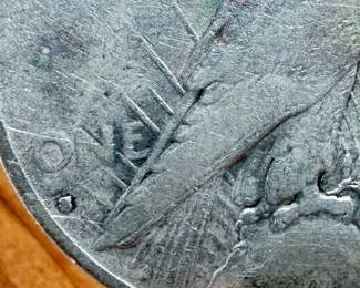 This lot features a 1935-S Peace Dollar.
