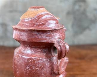 This lot features a pre-columbian style effigy vessel in good overall condition that measures, 10” H x 8” W x 7” D.