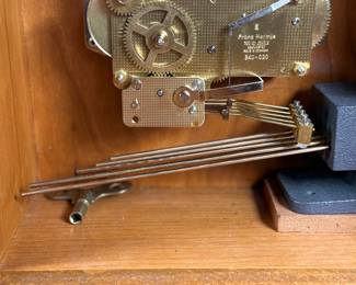This lot features an Emperor Mantel Clock in good working condition with a key. This clock measures, 15” H x 11” W x 6” D. Franz Hermle two (2) jewel movement.