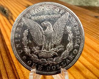 This lot features a 1881-S Morgan Dollar.