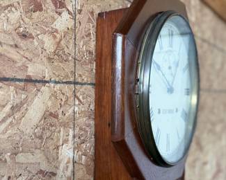 This lot features a Seth Thomas “World” model long-drop schoolhouse clock from the late 19th century.  It features a distinctive octagonal top and a long lower case for the pendulum. Tested and in good working condition with key. Measures, 32” H x 17” W.