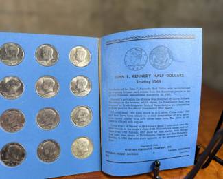 This lot features a beautiful collection of Kennedy half dollars, displayed in a Whitman folder. There are a total of thirty-six (36) Kennedys. 