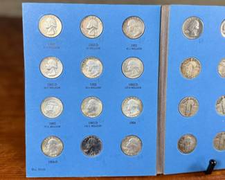 This lot features a beautiful collection of silver quarters, held and displayed in a Whitman folder. There are a total of thirty-three (33) silver quarters.