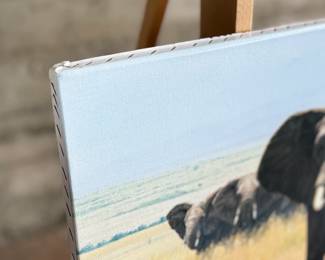 “Confrontation”, a limited edition giclee canvas print by listed artist, Simon Combes. Measures in frame, 18” H x 36” W.   