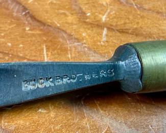 Vintage woodworking tools, including chisels and gouges with wooden handles. Some tools are marked “Buck Bros, ” known for quality craftsmanship. Handles exhibit wear consistent with age and use. The lot includes a variety of sizes and types for woodworking projects or collection purposes. Condition varies, with some minor rust and patina on metal components.