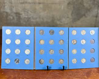 This lot features a beautiful collection of silver quarters, held and displayed in a Whitman folder. There are a total of thirty-three (33) silver quarters.