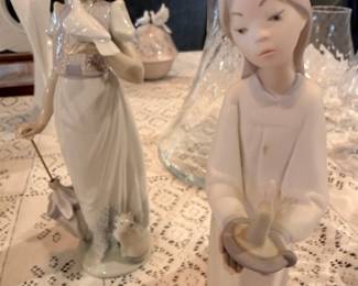 Lladro Porcelain Figurines - Summer Stroll (#7611) and Girl with Candle (#4868)