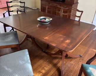 Chippendale Double Pedestal dining table with 2 arm chairs and 4 chairs(extra leaf and table pad not shown)