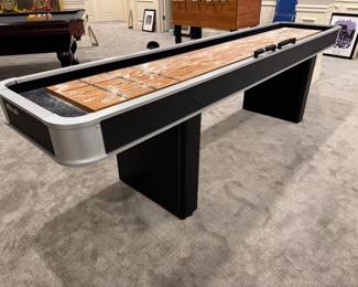 Atomic shuffleboard table