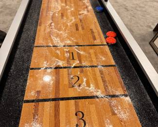 Atomic shuffleboard table