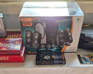 Fire proof safe...key at checkout, dominoes train set, scrabble and scrabble deluxe, speakers new in box.