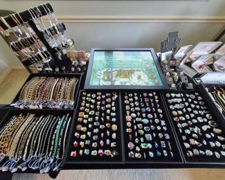 All bracelets and rings in this picture are sterling with the exception of the ones in the case.