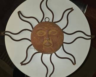 Ceramic and metal wall hanging.