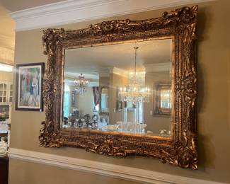 #24	Gold Ornate Framed Mirror (64w x 52h)	 $200.00 