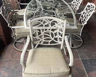 #98	Glass top Aluminum Table (73l x 42w x 28h) w/ 6 Chairs (4 swivel, 2 fixed) and Cushions 	 $300.00 