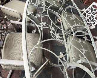 #98	Glass top Aluminum Table (73l x 42w x 28h) w/ 6 Chairs (4 swivel, 2 fixed) and Cushions 	 $300.00 