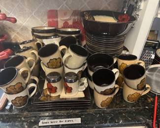 #42	"Mikasa - Painted Poppies (53 Pieces) 8 Dinner plates, 11 Lunch Plates, 4 Large Oval Platters, 2 Soup Mugs, 1 Large Serving Bowl, 15 Coffee Mugs, 12 Soup Bowls, Salt & Pepper"	 $100.00 