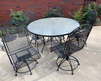 #93	Round Glass Top Wrought Iron Table (48w x 29h) with 4 Swivel Bouncy Chairs	 $150.00 