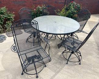 #93	Round Glass Top Wrought Iron Table (48w x 29h) with 4 Swivel Bouncy Chairs	 $150.00 