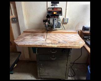 Craftsman 10 Inch Radial Saw Mounted on a Heavy Duty Metal Chest