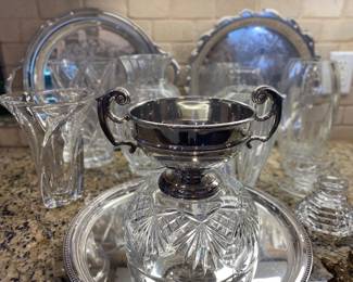 Beautiful crystal vases and silver plate items