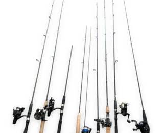 Eight Fishing Poles  Tackle Boxes