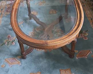 Carved Wood Oval Coffee Table with Glass Top third image