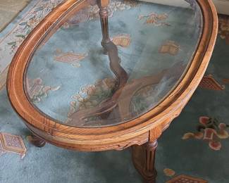 Carved Wood Oval Coffee Table with Glass Top