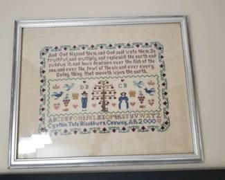 Framed cross-stitch panel