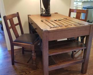 Arts & Crafts style library desk and two side chairs (sold separately)