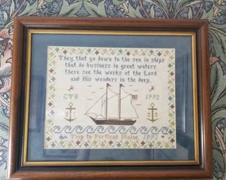 Framed cross-stitch panel