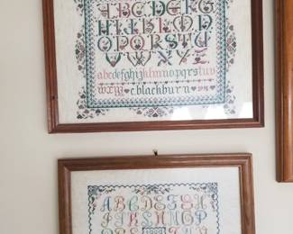 Framed cross-stitch panels