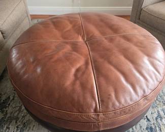 Top grain round leather ottoman 