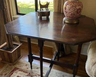 1875 American Eastlake tilt top/drop leaf table 