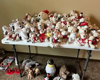 We have a HUGE collection of Coca-Cola plush bears, tins, and other plush toys