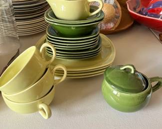A number of place settings, China cups, full China table settings also