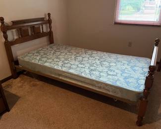 Solid hardwood twin bed with headboard and box springs.  Has matching desk and chair