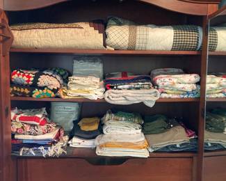 Textiles including handmade quilts
