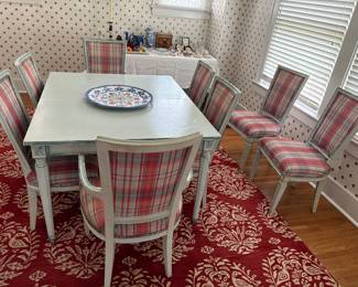 2 arm chairs, 6 side chairs, 2 leaves and table pads