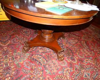 Single Carved Support and Lg. Claw Feet adorn this Antique Table