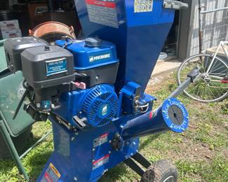 Powerhorse 3-in-1 Wood Chipper/Shredder, likely featuring a 212cc or 420cc gas engine [5.1, 5.2].