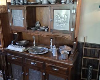 Pewter and a redone bennington pine hutch with punched tin doors
