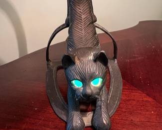 Vintage Cast Iron Crouching Cat Lamp with Glowing Green Eyes and Iridescent Glass Shade