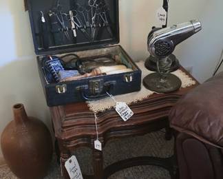 Vintage barber kit, tools of the trade including owner's credentials.